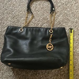 MK Med size black shoulder bag